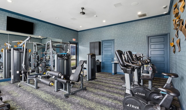fitness center with workout equiptment