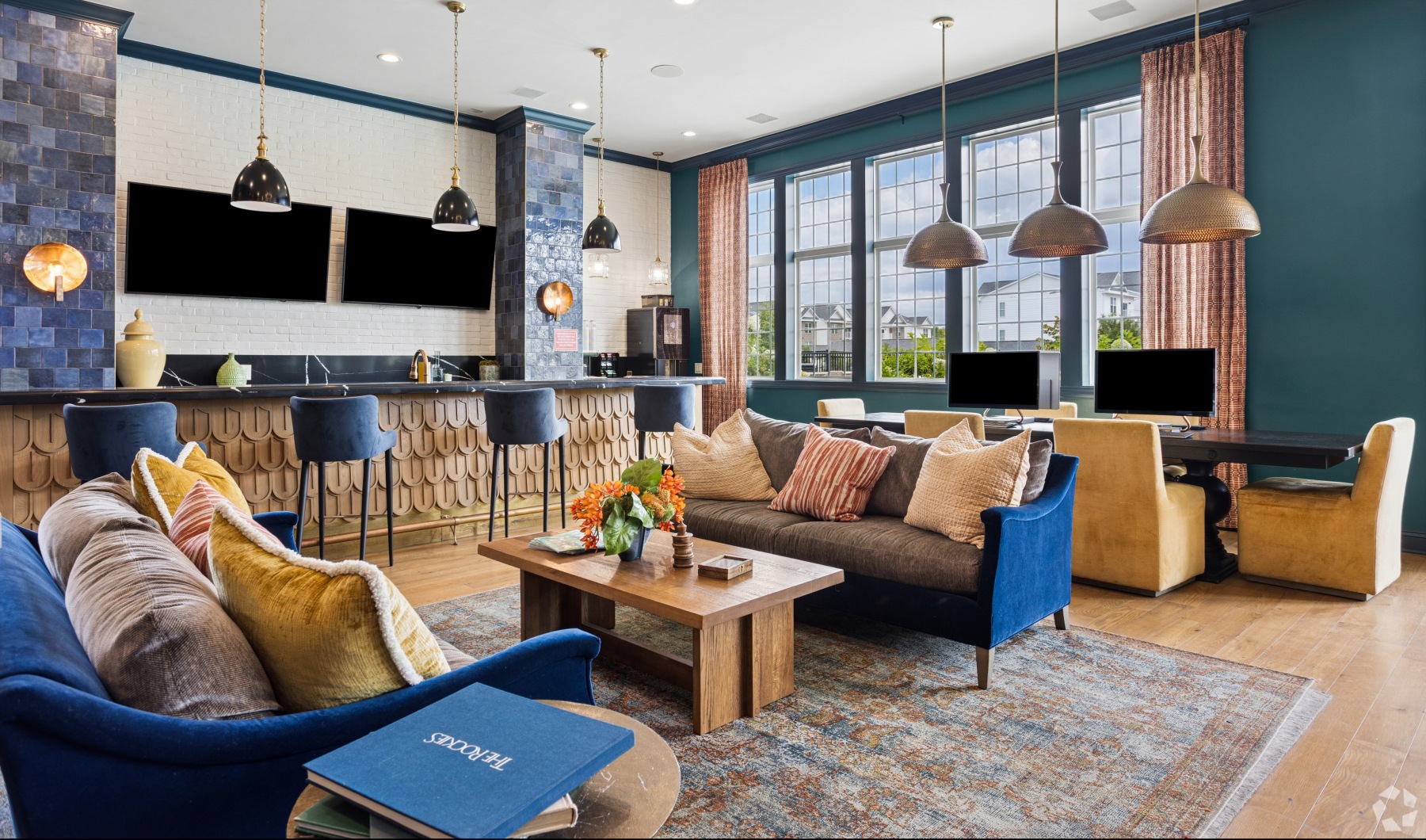 leasing office with tables and sofas